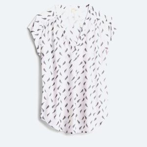 Off white w/ feathers, lightweight, short sleeve blouse.